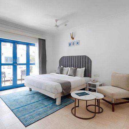 Azalea By Stone Wood Premier Hotel Varca Bagian luar foto