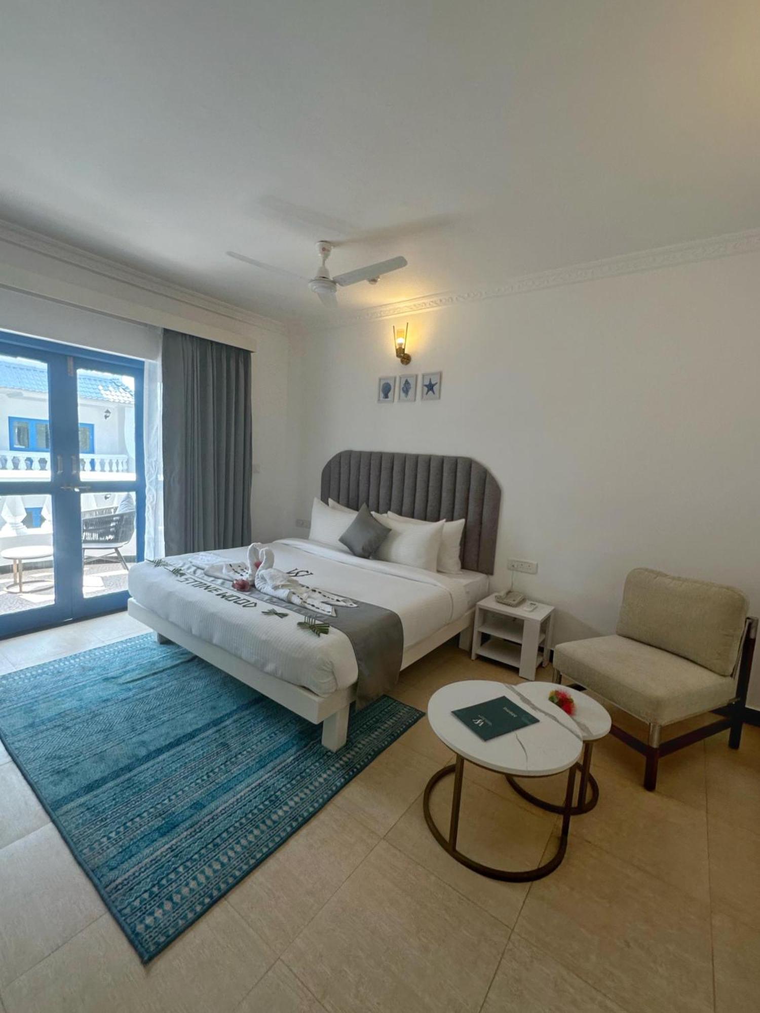 Azalea By Stone Wood Premier Hotel Varca Bagian luar foto