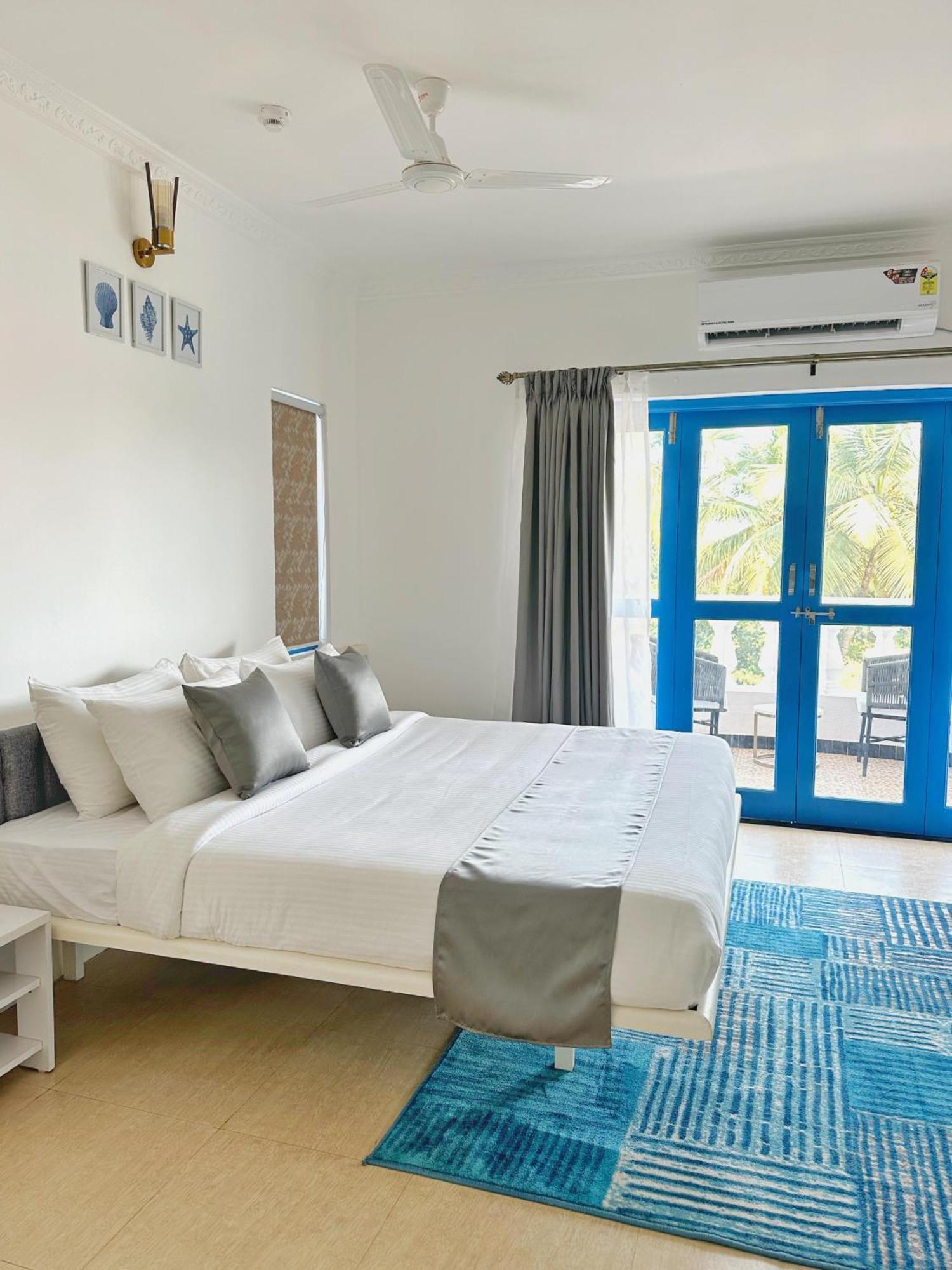 Azalea By Stone Wood Premier Hotel Varca Bagian luar foto
